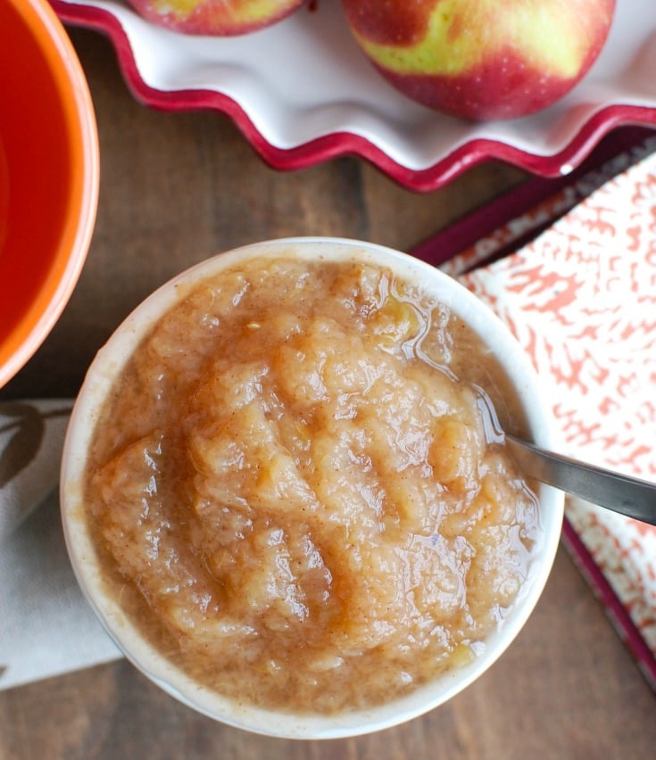 Crockpot Applesauce with spoon.