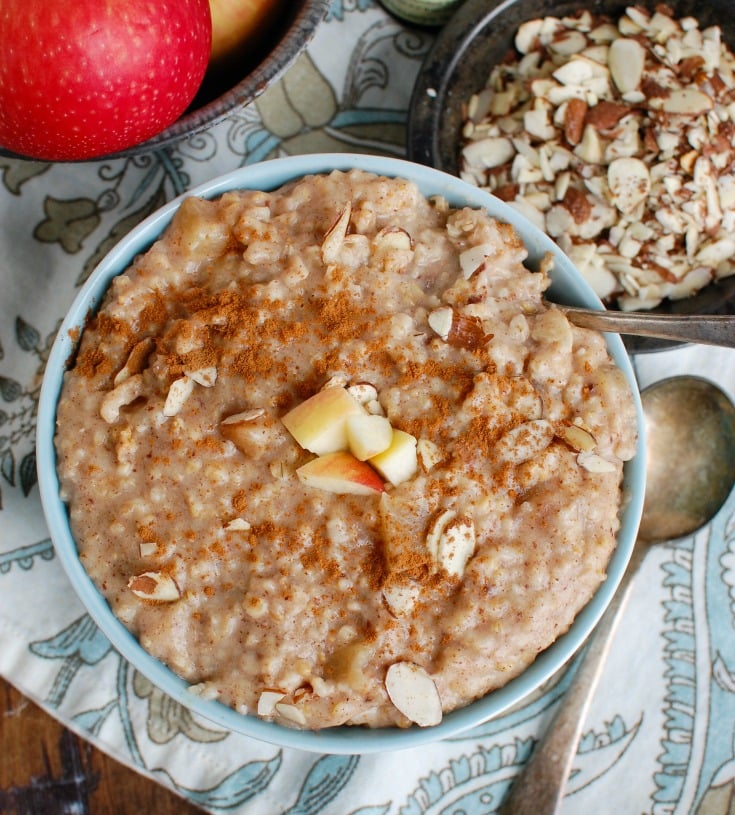 Slow Cooker Steel Cut Oats in a blue bowl above.