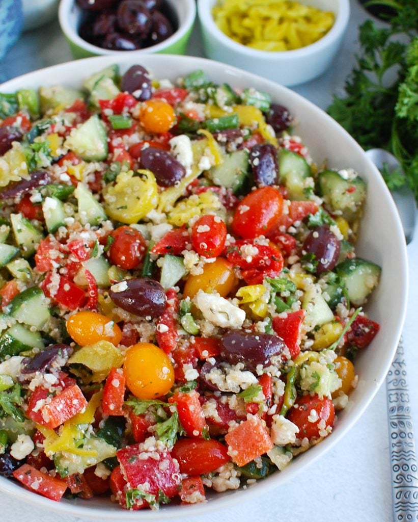 Greek Quinoa Salad in a white bowl