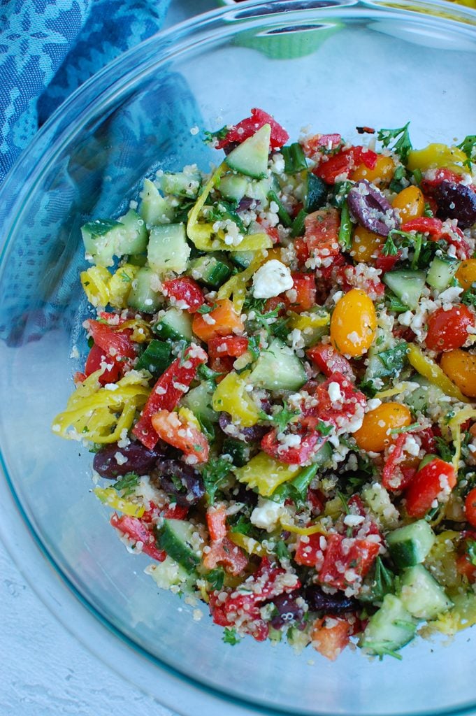Greek Quinoa Salad in clear bowl 