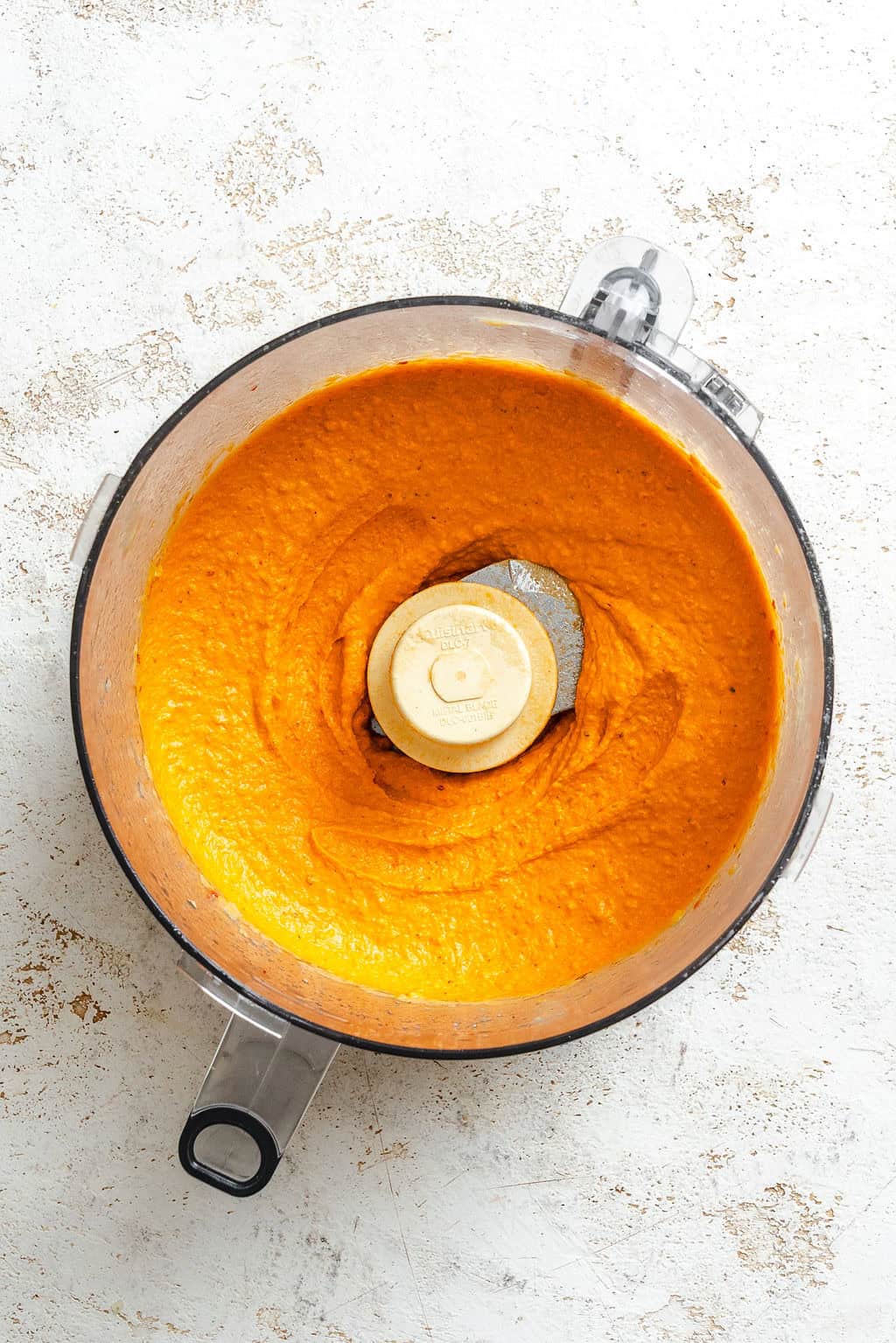 Roasted Red Pepper Hummus pureed in a blender.