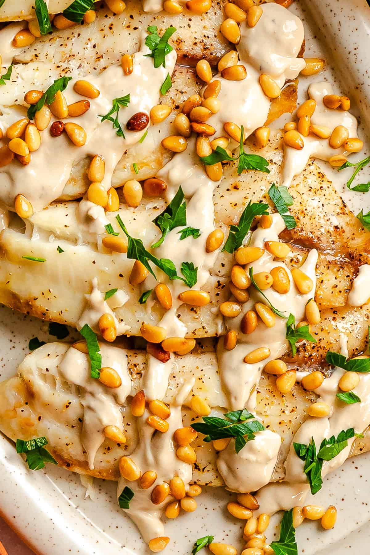 Easy White Fish with Tahini Sauce and Pine Nuts