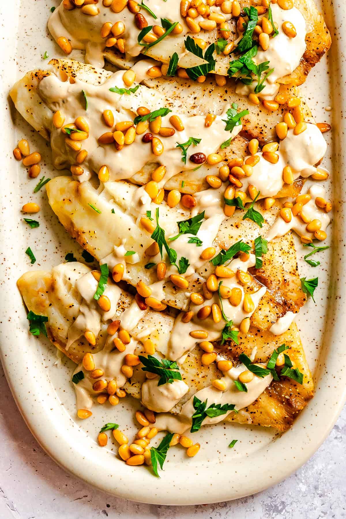 Simple Baked White Fish with Tahini Sauce