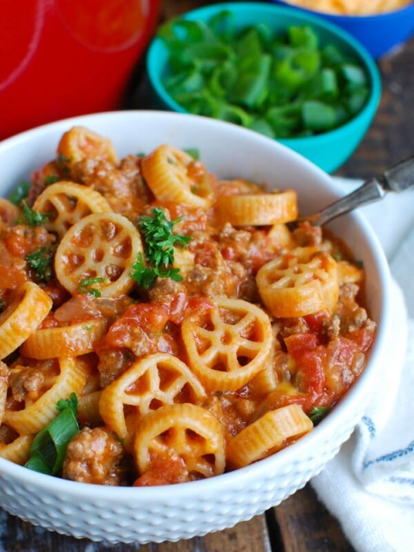 One Skillet Cheesy Hamburger Pasta is a quick and easy one skillet or pot meal mixing ground beef, tomatoes, cheese and pasta to create a cheesy hamburger dish.  The leftovers reheat wonderfully so you have options for lunch and dinner later in the week!