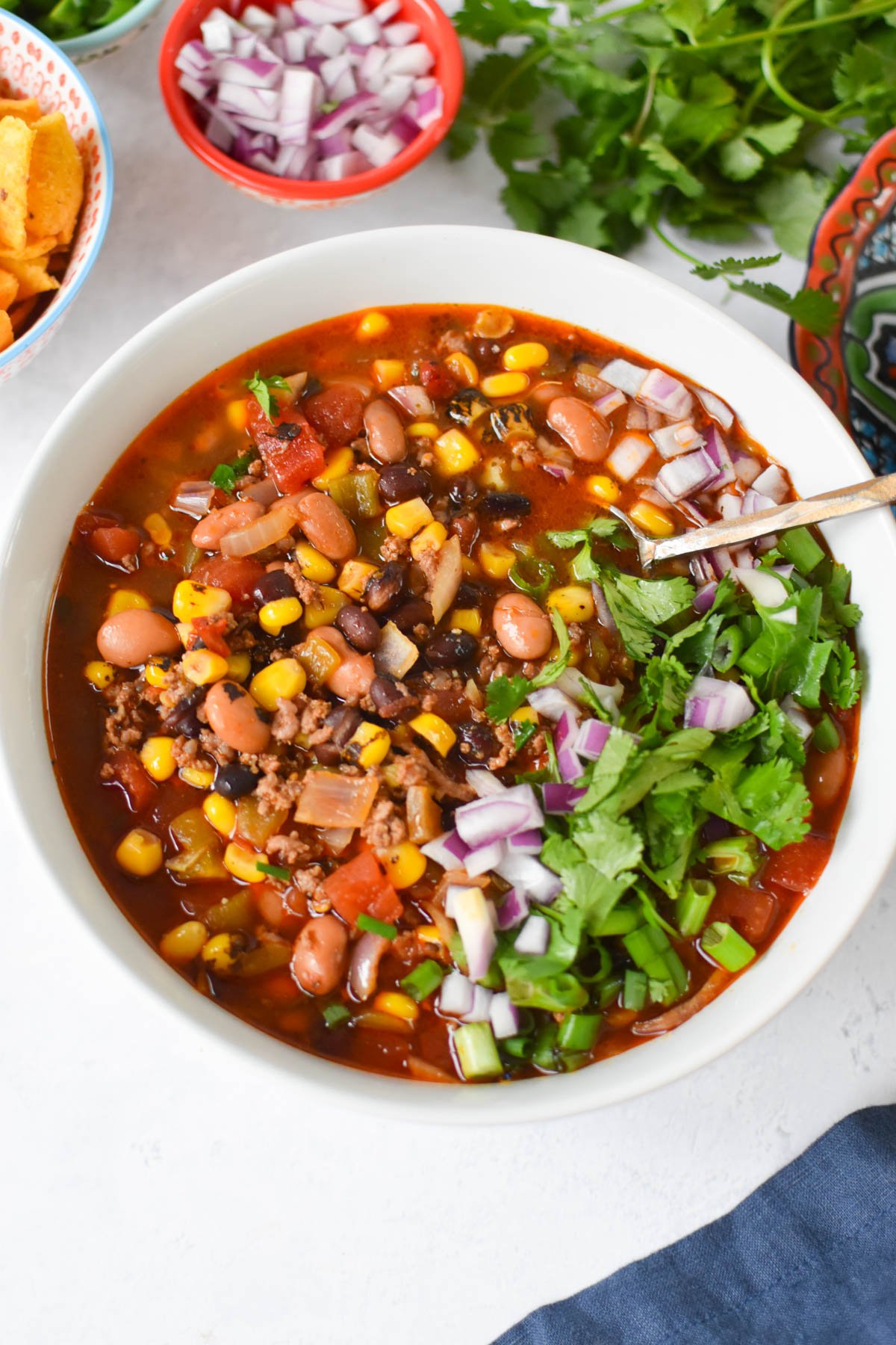 Slow Cooker Taco Soup Recipe in a white bowl 