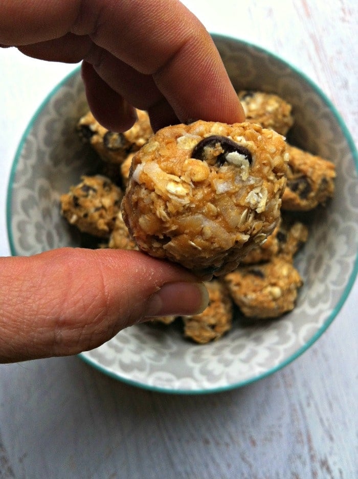 Peanut Butter Coconut Oatmeal Bites in hand
