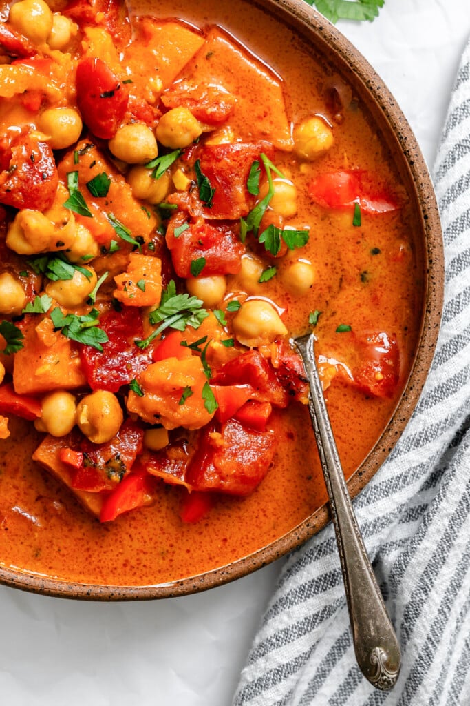 Butternut Squash Chickpea Curry in a bowl with spoon 