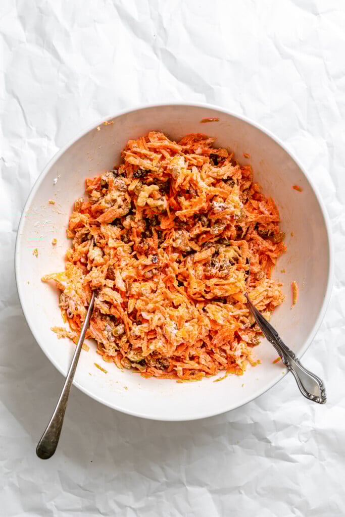 Carrot Raisin Salad yogurt and carrots mixed together 