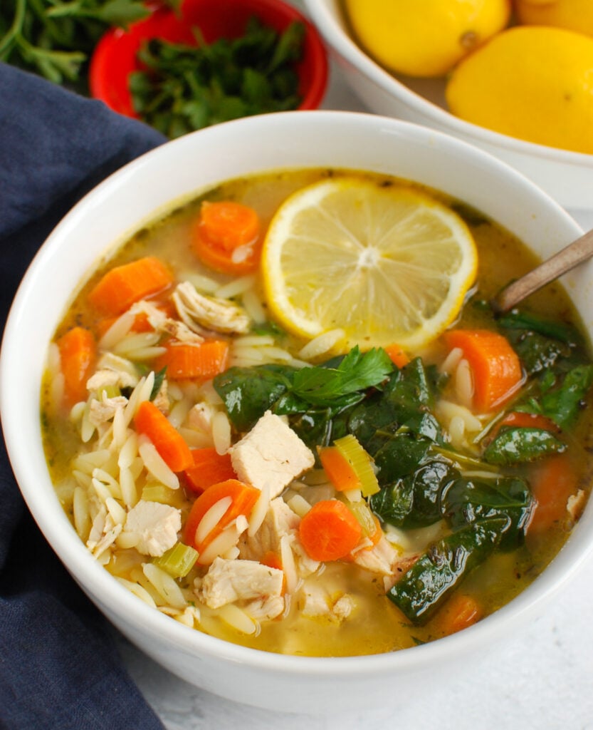 Lemon Chicken Orzo Soup with a spoon