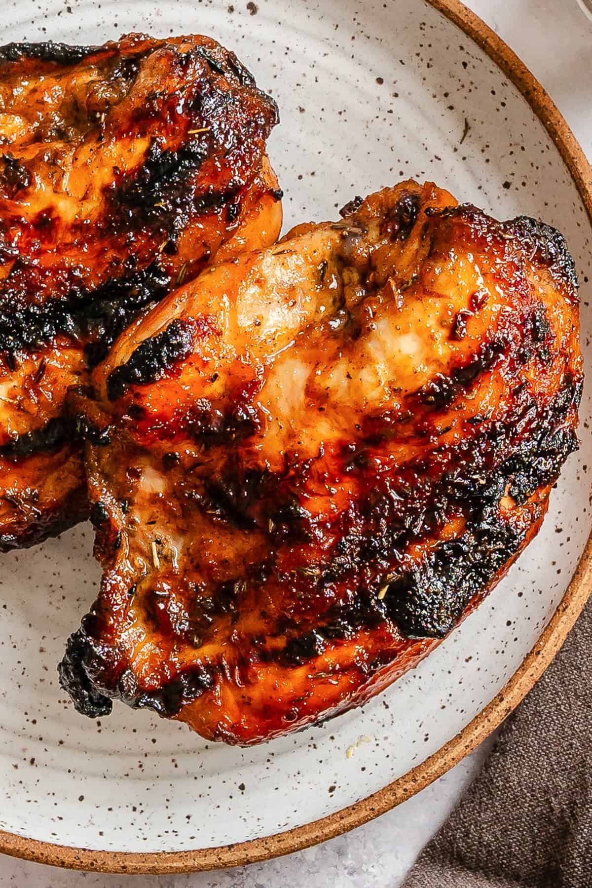 Easy Spiced Lime Honey Chicken on a white plate