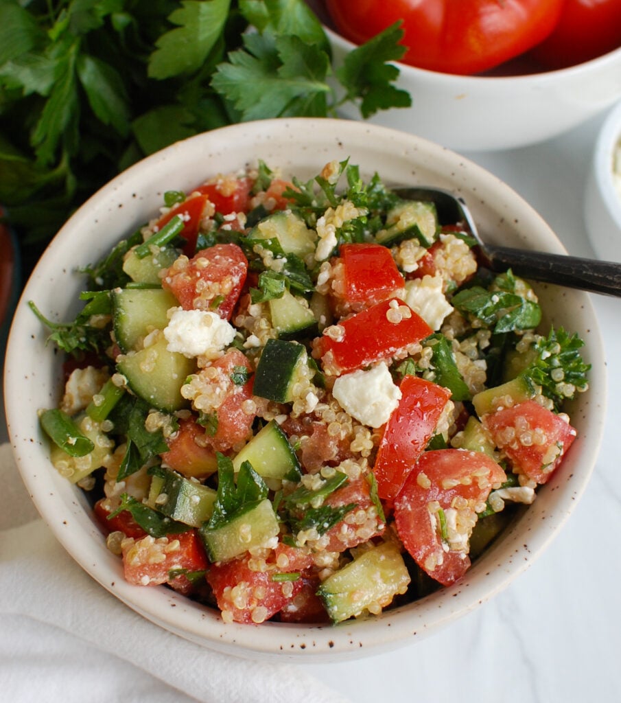 Tomato Cucumber Feta Quinoa Salad in small bowl 