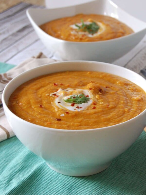 Moroccan Carrot Red Lentil Soup is a meatless soup recipe packed full of flavor! Cumin, turmeric, coriander, paprika and cinnamon compliment the red lentils and carrots, creating a creamy, filling soup. 