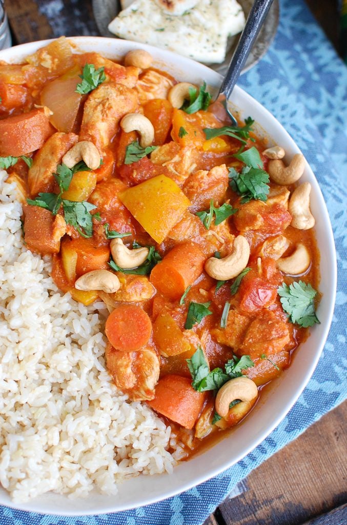 Slow Cooker Coconut Curry Chicken with in White Bowl 