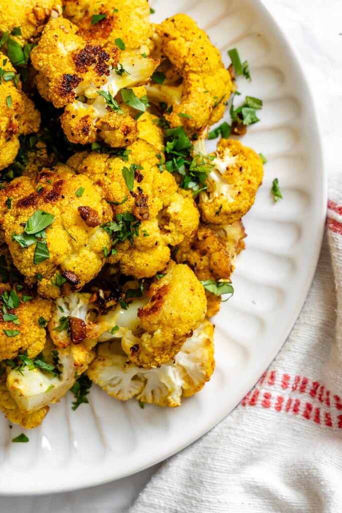 Curry Roasted Cauliflower on white plate