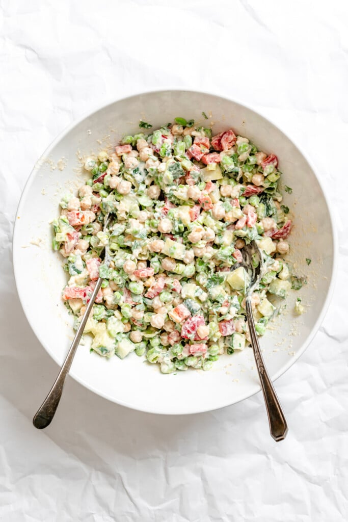 Edamame Chickpea Feta Salad in bowl with two forks
