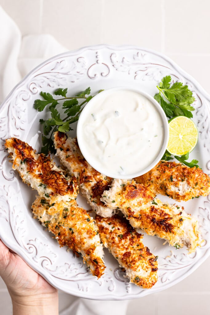 Coconut Chicken Tenders on a white plate