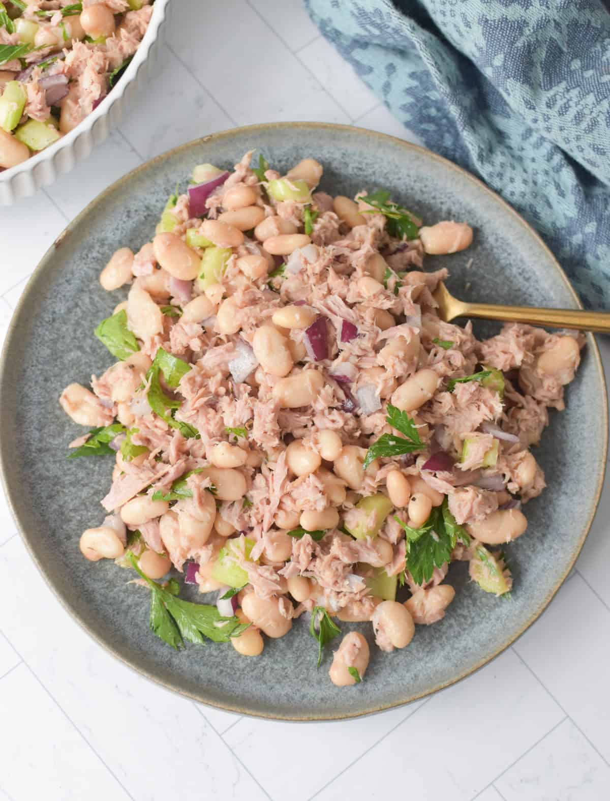 White Bean and Tuna Salad on a blue plate 