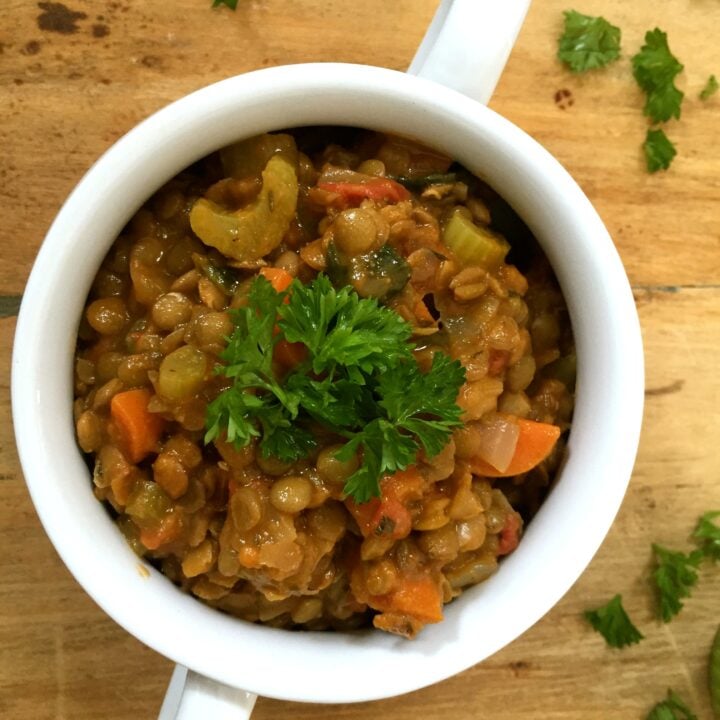 Green Lentil Spinach Soup with parsley.