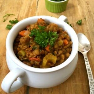 Green Lentil Spinach Soup with spoon.