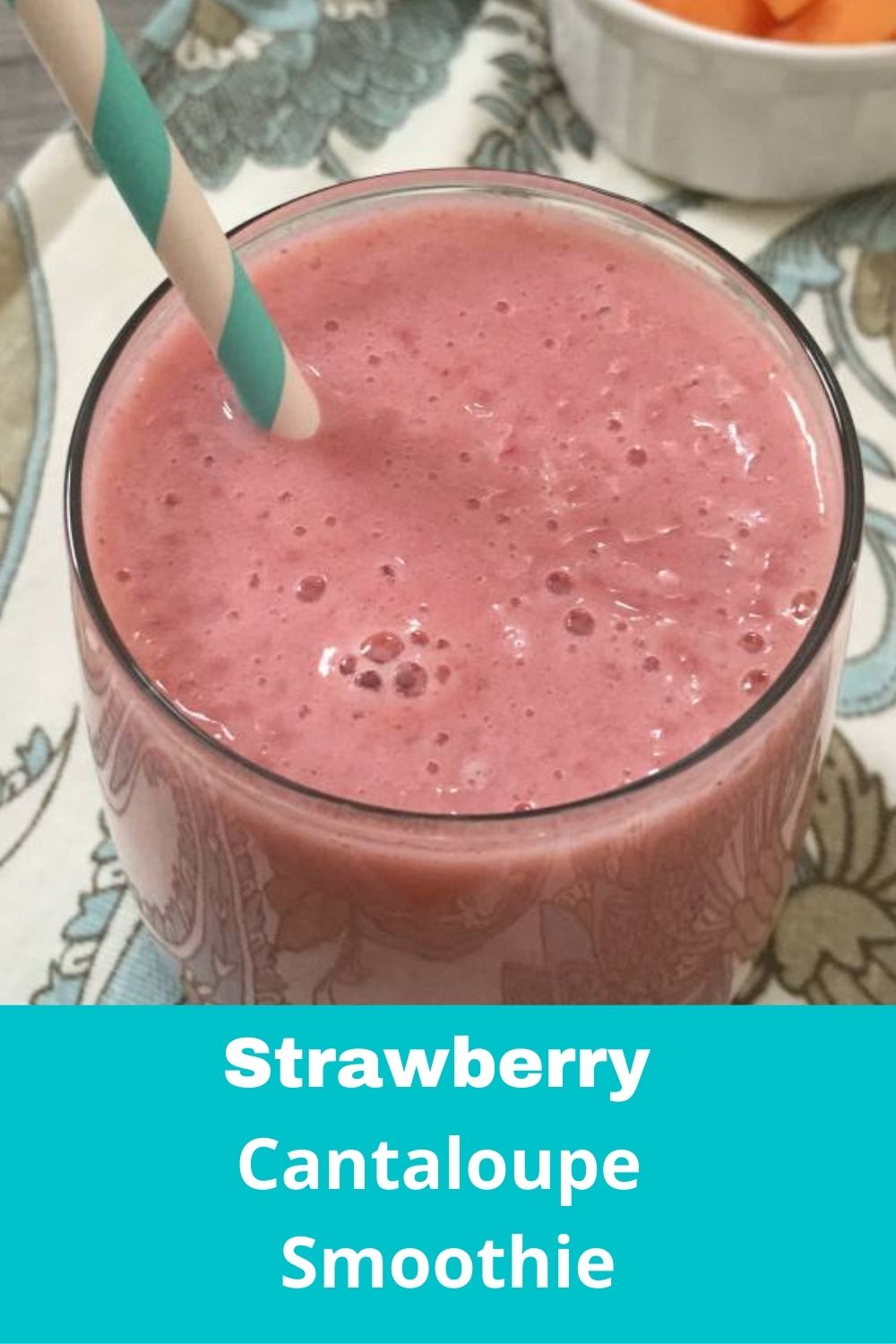 Strawberry Cantaloupe Smoothie  with straw.