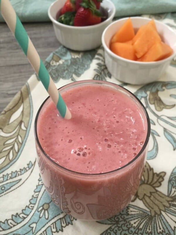 Strawberry Cantaloupe Smoothie in a glass.