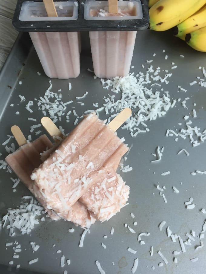 Strawberry Banana Coconut Cream Popsicles are a sweet treat and perfect for summer. These taste creamy and indulgent while being healthy!