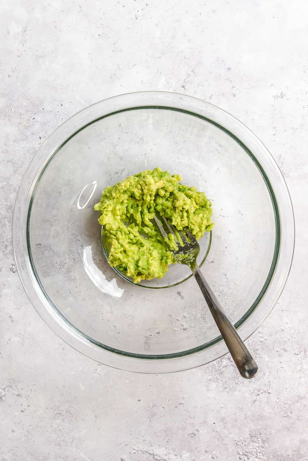 Avocado mashed in a bowl