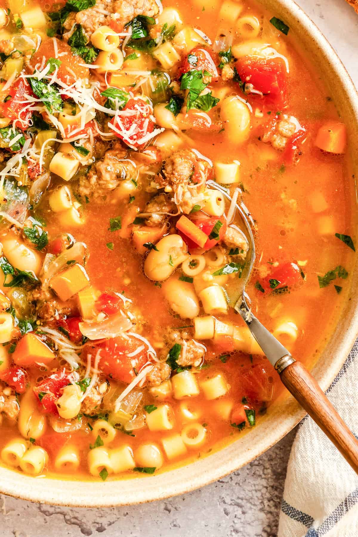 Pasta e Fagioli in dutch oven with a spoon