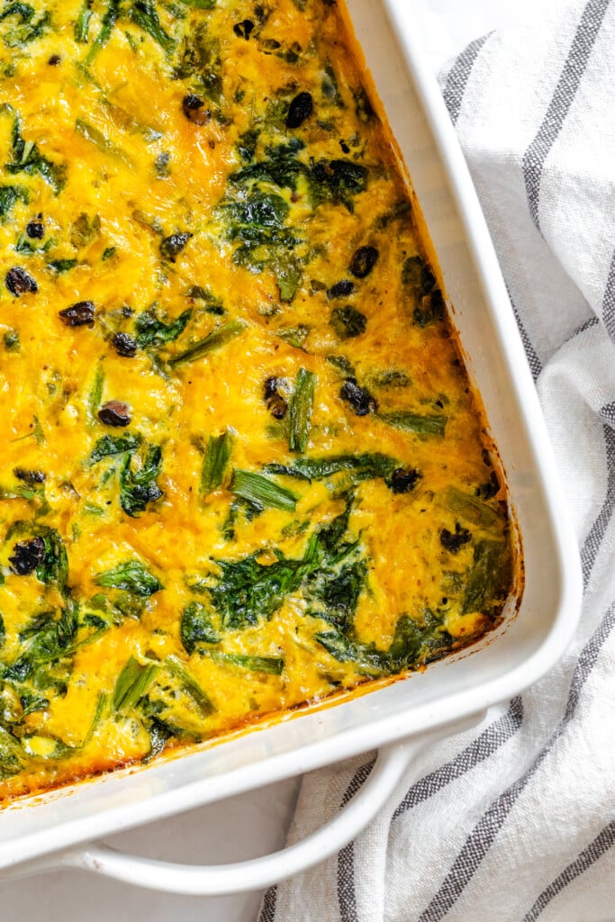 Cheesy Black Bean Egg Bake in a white dish