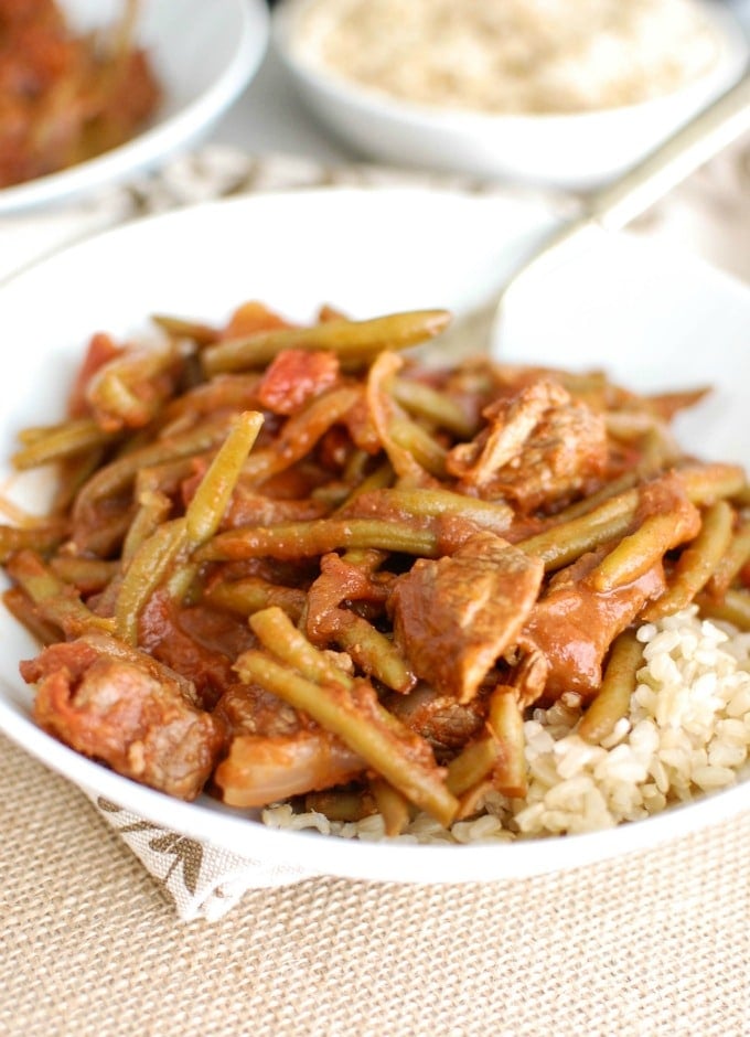 Lebanese Beef and Green Beans with spoon.