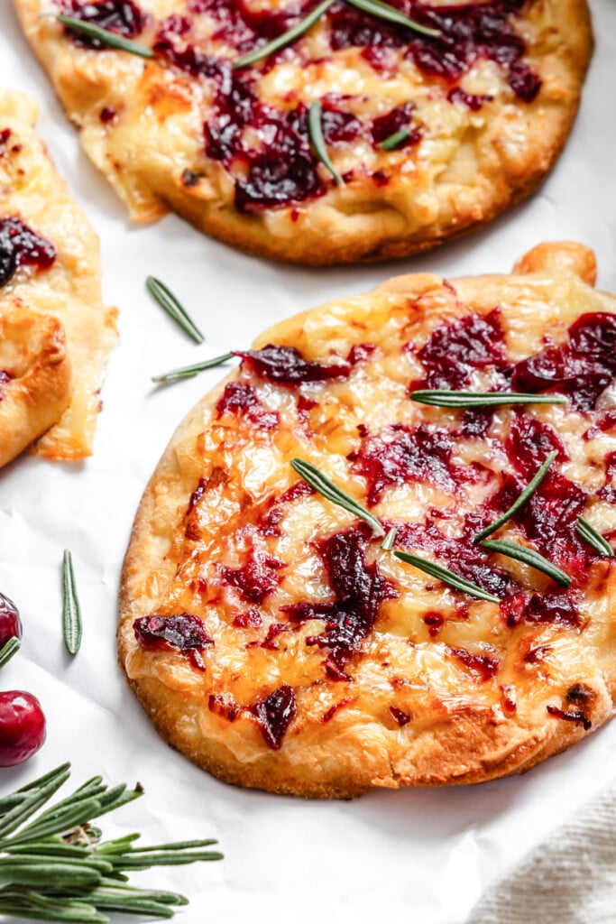 Warm Brie Cranberry Naan on a white paper 
