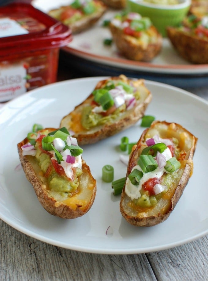 Guacamole Stuffed Potato Skins three on a palte