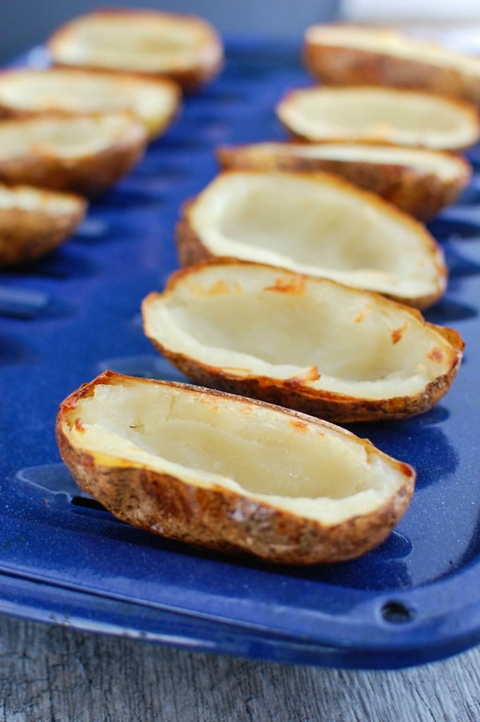 Guacamole Stuffed Potato Skins on a baking sheet