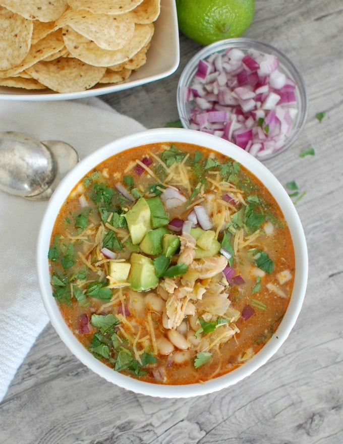 Slow Cooker White Chicken Chili with a spoon.