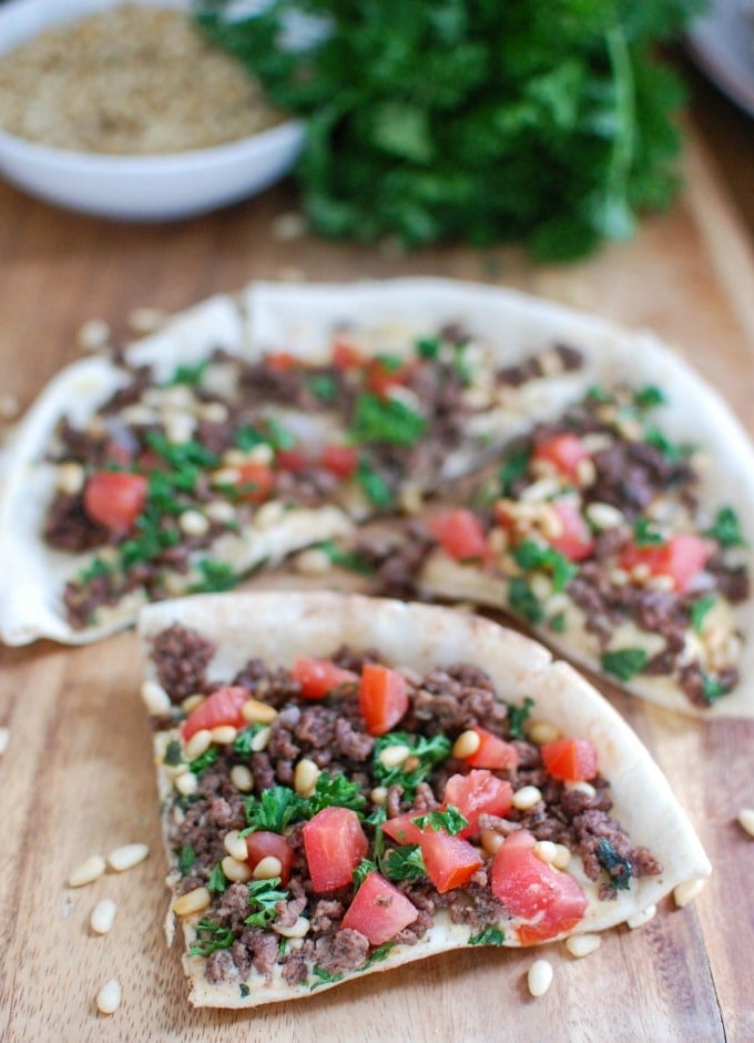 Spiced Beef and Hummus Pita Pizza with slicer 
