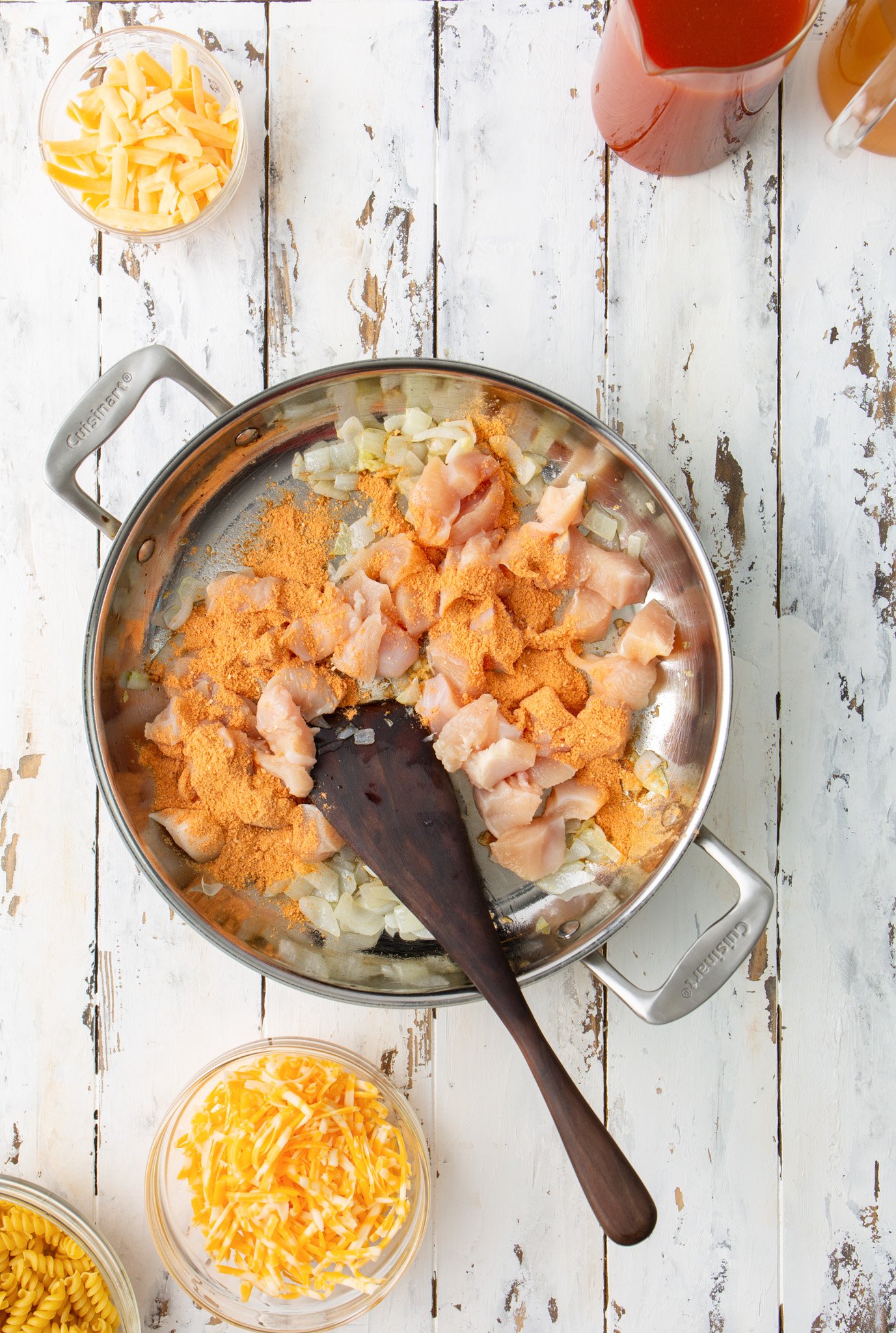 One Pot Chicken Enchilada Pasta chicken in a skillet 