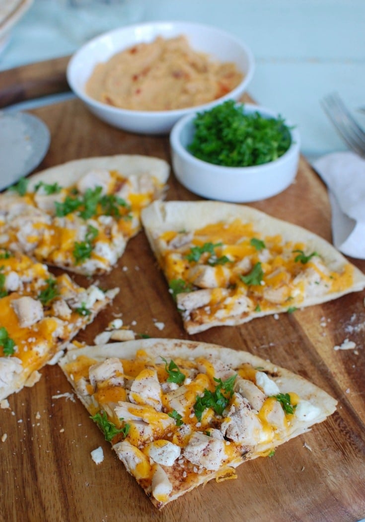 Chicken Feta Cheddar Pita Pitza with parsley. 