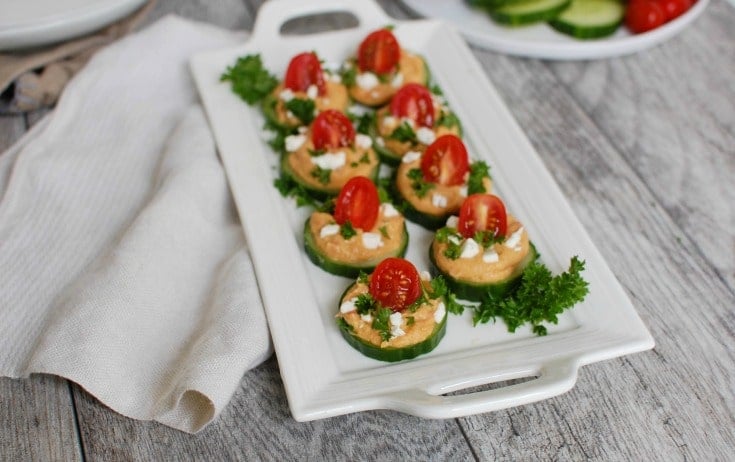 Slices Of Cucumber With Hummus,healthy snacks,healthy snacks for weight loss,healthy snacks list,healthy snacks ideas,healthy snacks recipes,healthy snacks for weight loss at night,healthy snacks to buy,healthy snacks for work,healthy snacks for adults