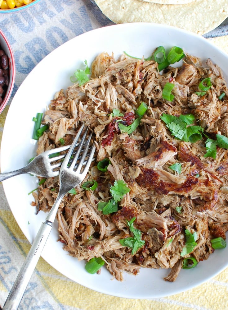Easy Slow Cooker Pork Carnitas In a White Bowl 