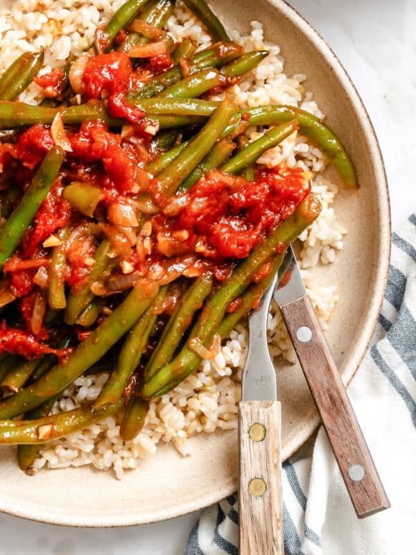 Lebanese Green Beans in a bowl with fork and knife