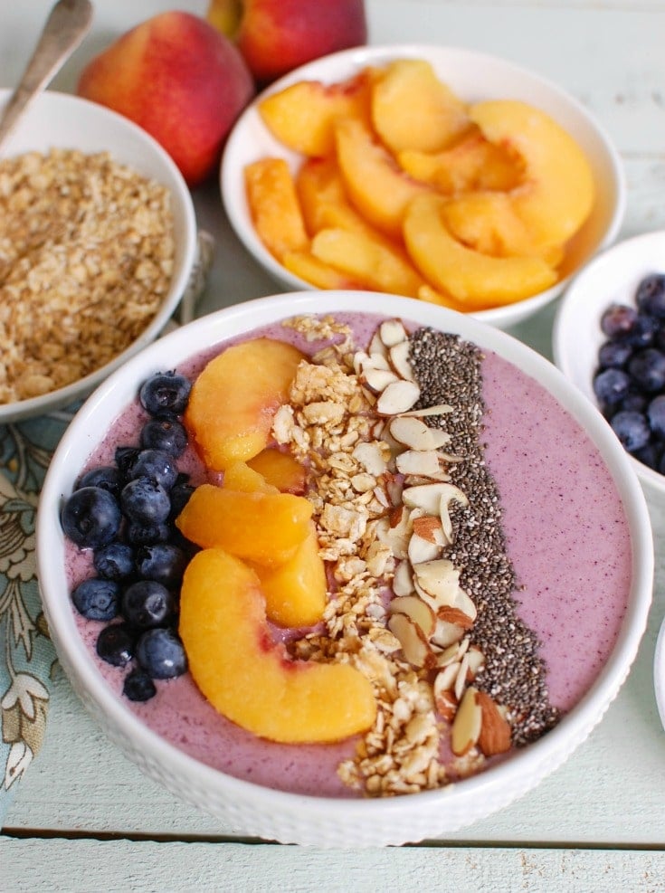 Peach Blueberry Smoothie Bowl is the perfect start to your day. Healthy ingredients make this a good choice for a snack too. 