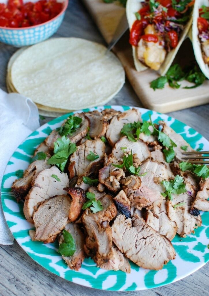 Asian Pork Tacos with Spicy Slaw are tender, flavorful tacos. These are so easy to make in the summer! 