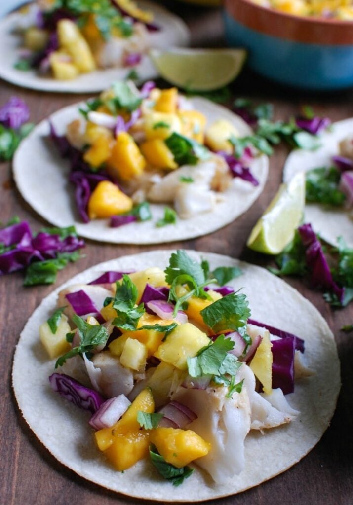 Grilled Fish Tacos with Tropical Salsa on cutting board 