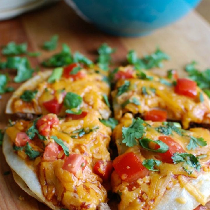 A Mexican Pizza is the perfect back-to-school dinner for your family that is easy to make, packed with flavor and a kid and adult favorite. Packed with protein and calcium, you can feel good putting this meal on your table!