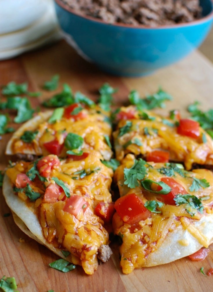 A Mexican Pizza is the perfect back-to-school dinner for your family that is easy to make, packed with flavor and a kid and adult favorite. Packed with protein and calcium, you can feel good putting this meal on your table!