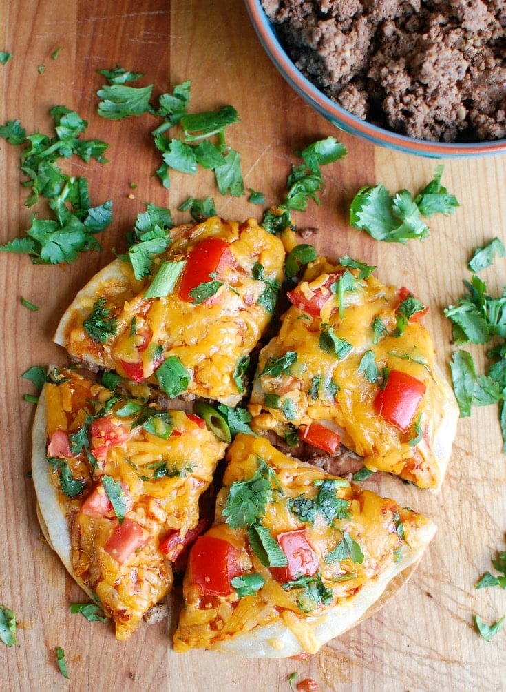 Mexican Pizzas are the perfect back-to-school dinner for your family that is easy to make, packed with flavor and a kid and adult favorite. Packed with protein and calcium, you can feel good putting this meal on your table! 