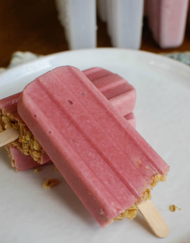 Strawberry Banana Yogurt Popsicles are the perfect summer treat. These are easily made at home!
