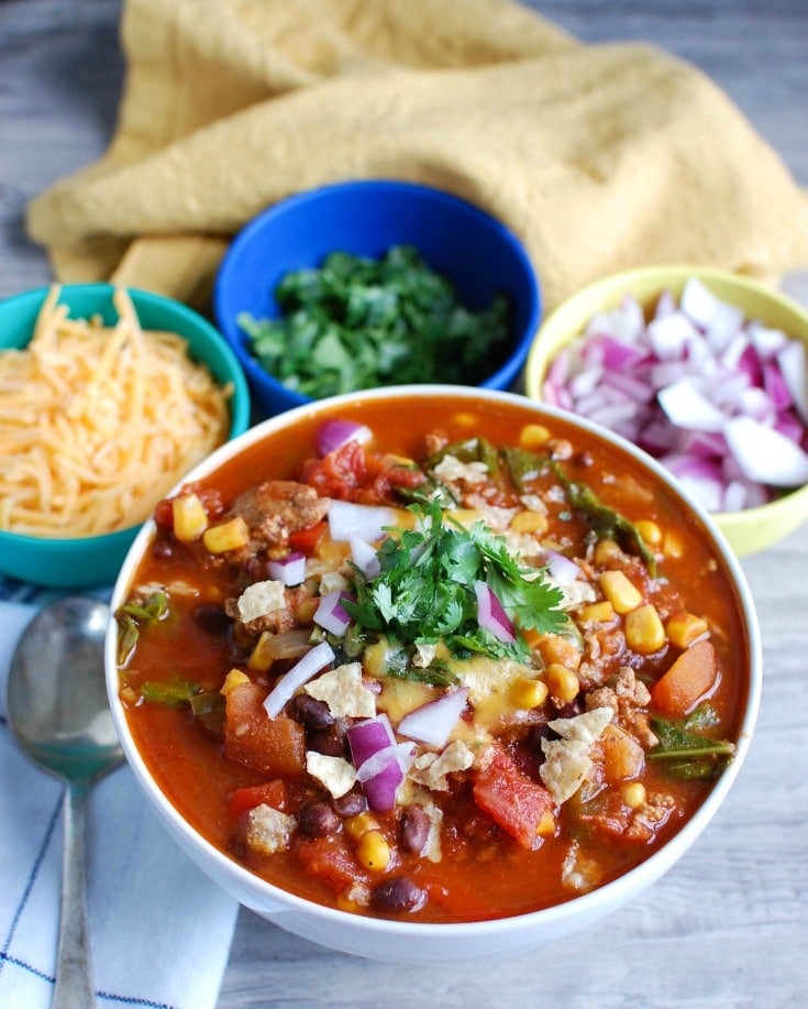 Who doesn't love a great slow cooker chili recipe? This Slow Cooker Turkey Kale Chili will warm your family up in the colder months and makes the perfect game day meal.