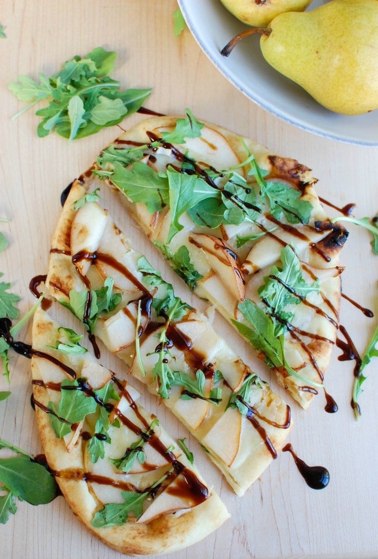Warm Pear Brie Arugula Naan with balsamic.,