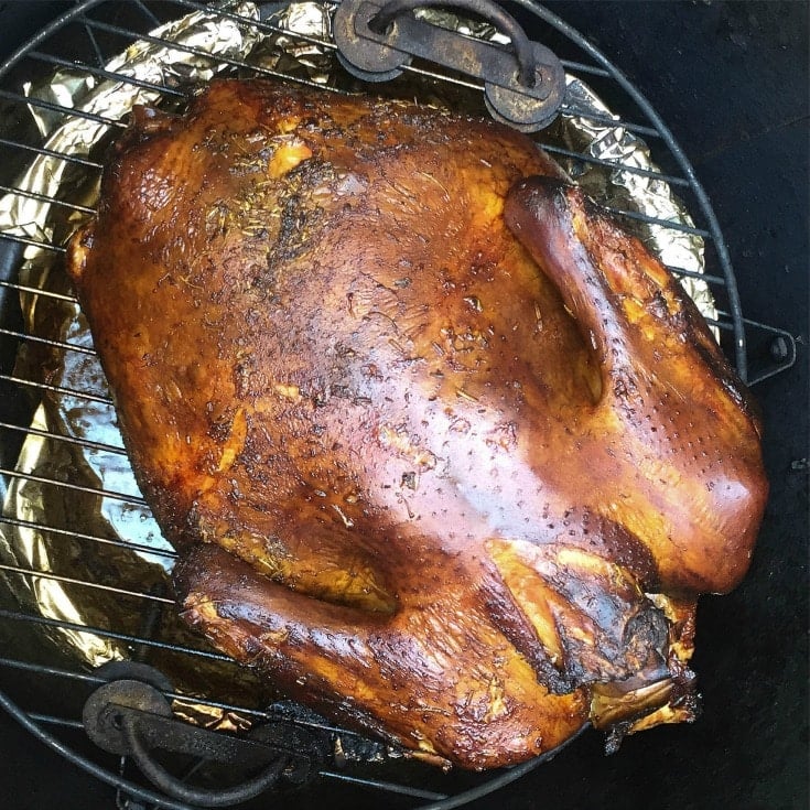 This Smoked Turkey recipe uses simple ingredients. Turkey is slowly smoked creating a crispy skin, tender inside and tons of flavor. If you are looking for a fun, new way to cook your Thanksgiving or Christmas turkey, look no further!